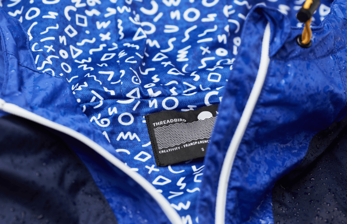 Sewn in Neck Tag on Rain Jacket